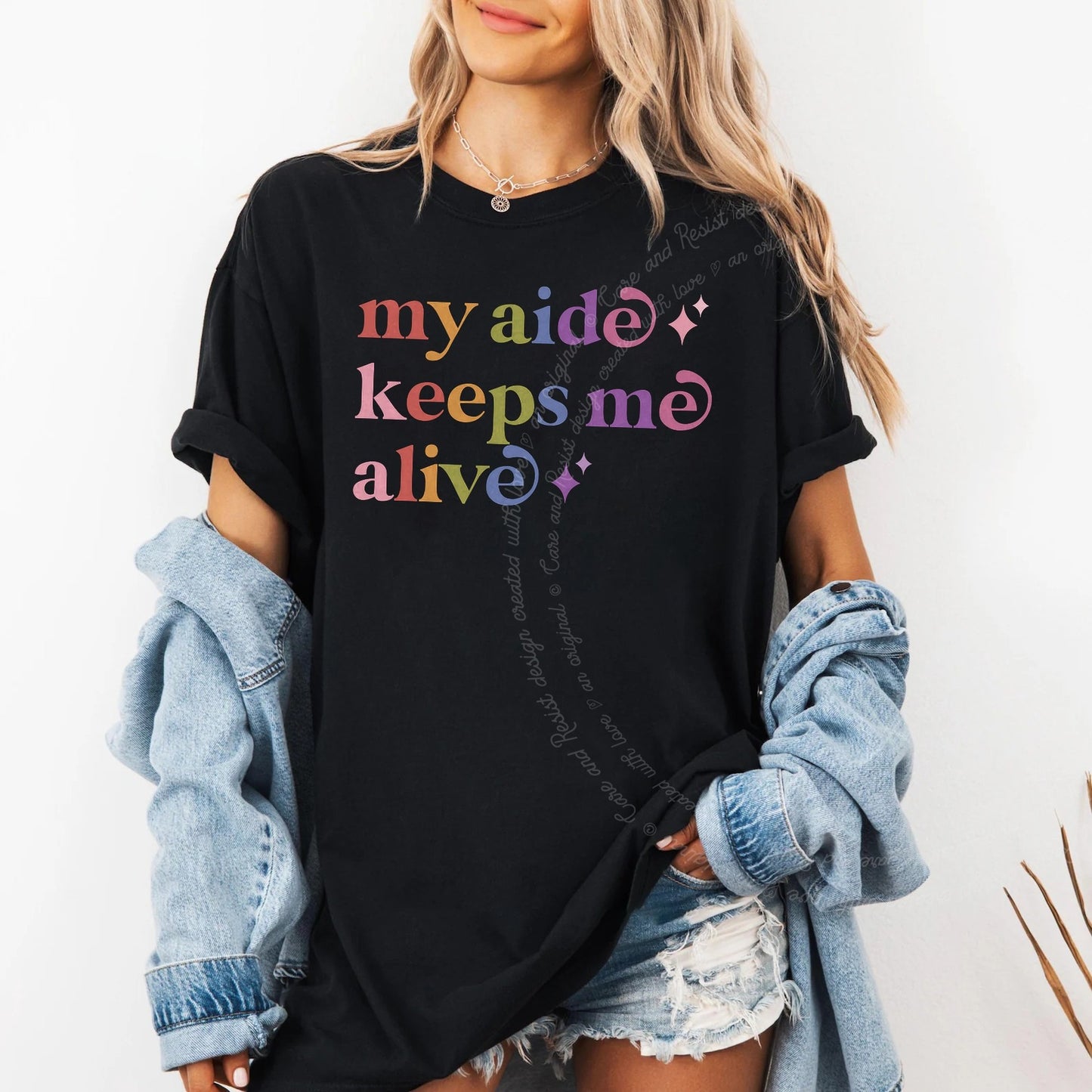 My Aide Keeps Me Alive Care & Resist rainbow Comfort Colors tee, Black