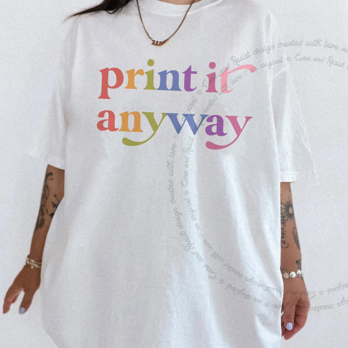 Print It Anyway Care & Resist rainbow tee