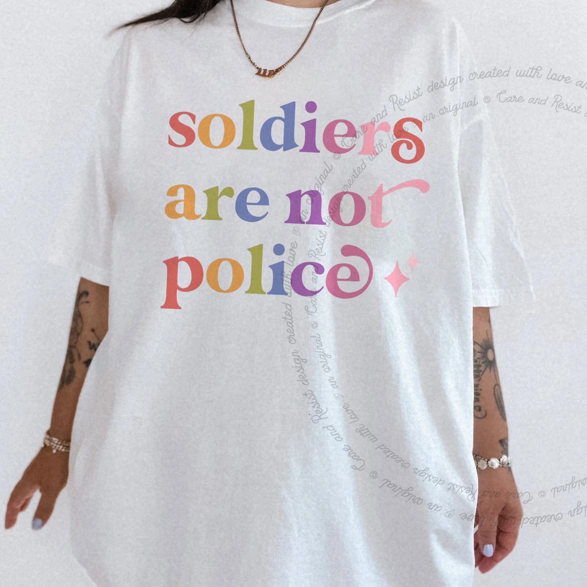 Soldiers are not Police Care & Resist rainbow Comfort Colors tee, White