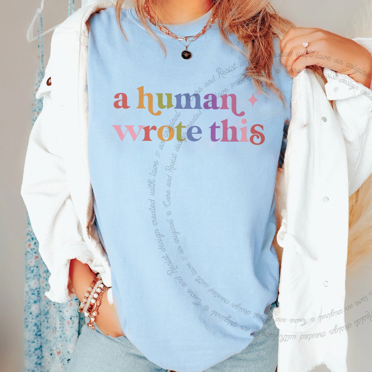 A Human Wrote This Care & Resist rainbow tee