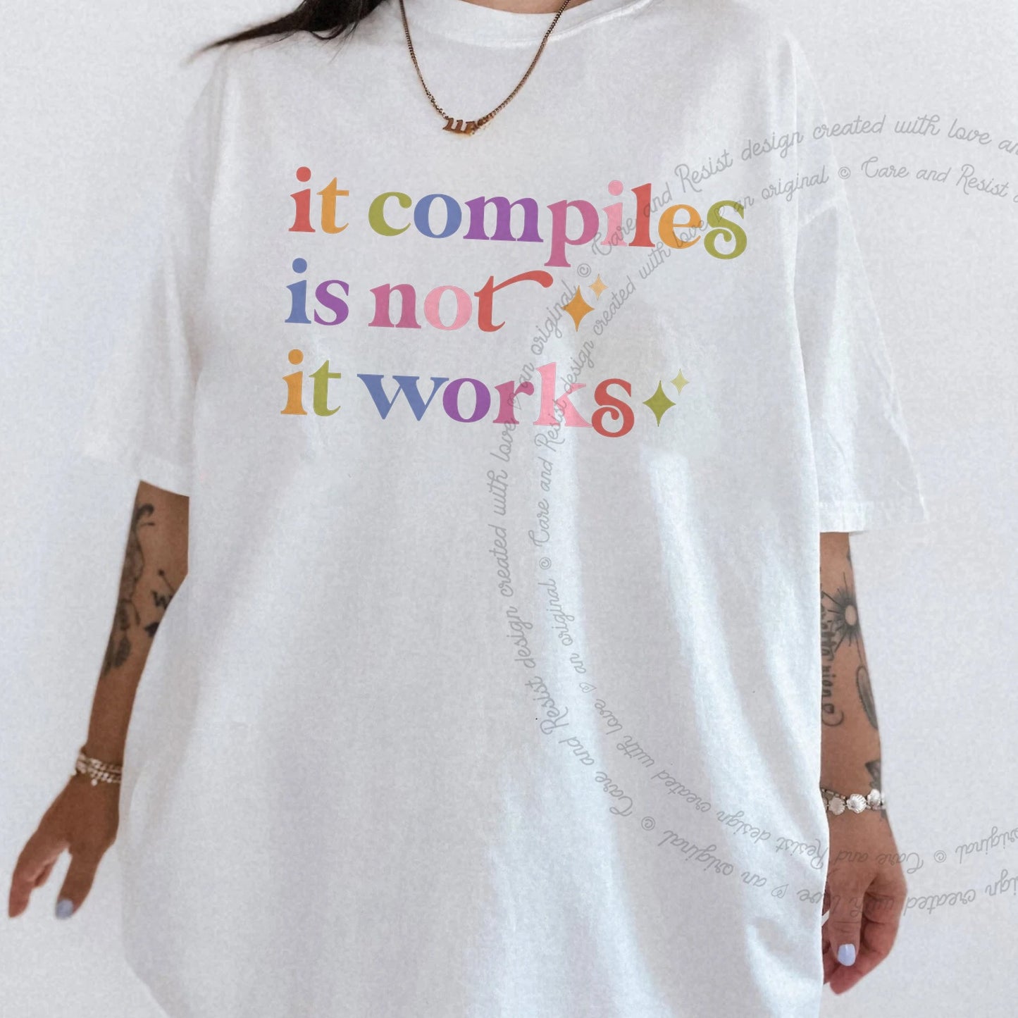 It Compiles is not It Works Care & Resist rainbow Comfort Colors tee, White