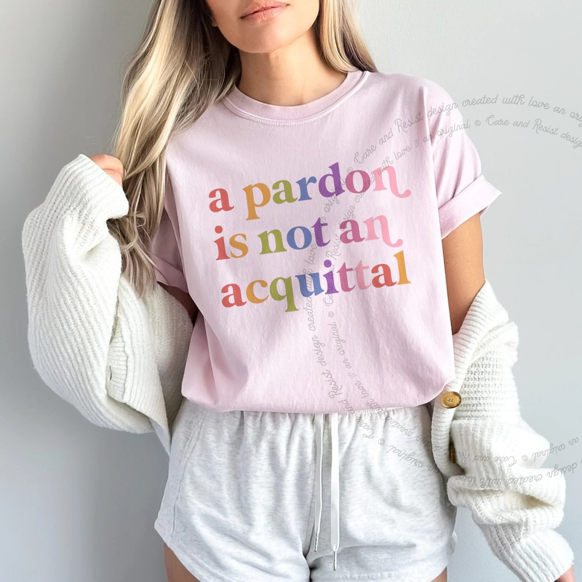 A Pardon is not an Acquittal Care & Resist rainbow tee