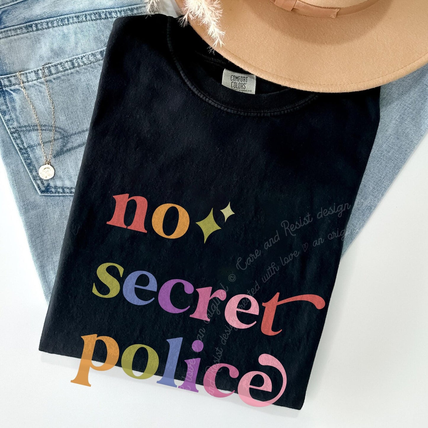 No Secret Police Care & Resist rainbow Comfort Colors tee, Black