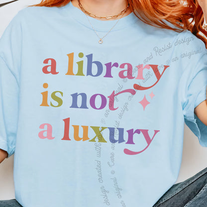 A Library is not a Luxury Care & Resist progressive t-shirt in Chambray