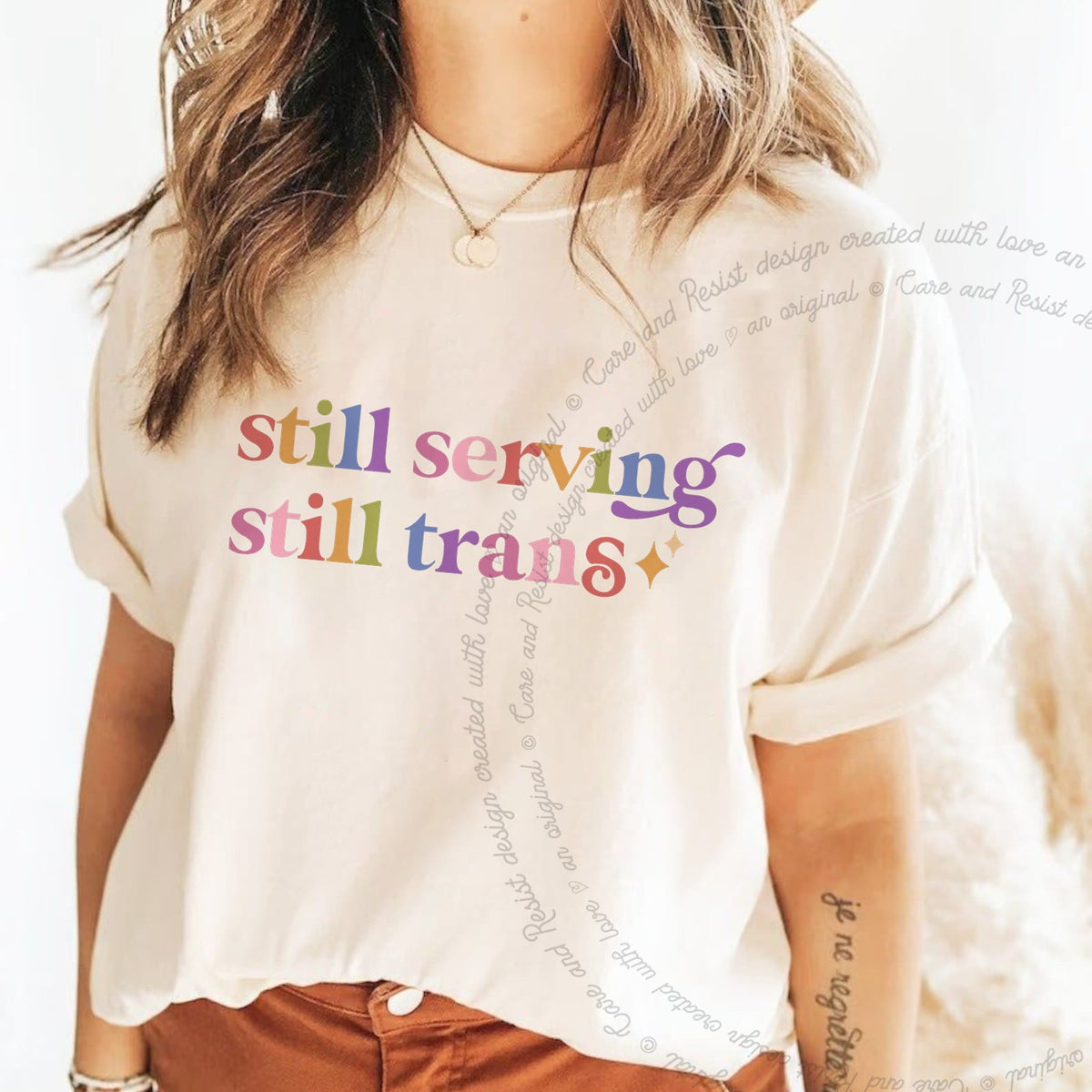 Still Serving Still Trans Care & Resist rainbow tee