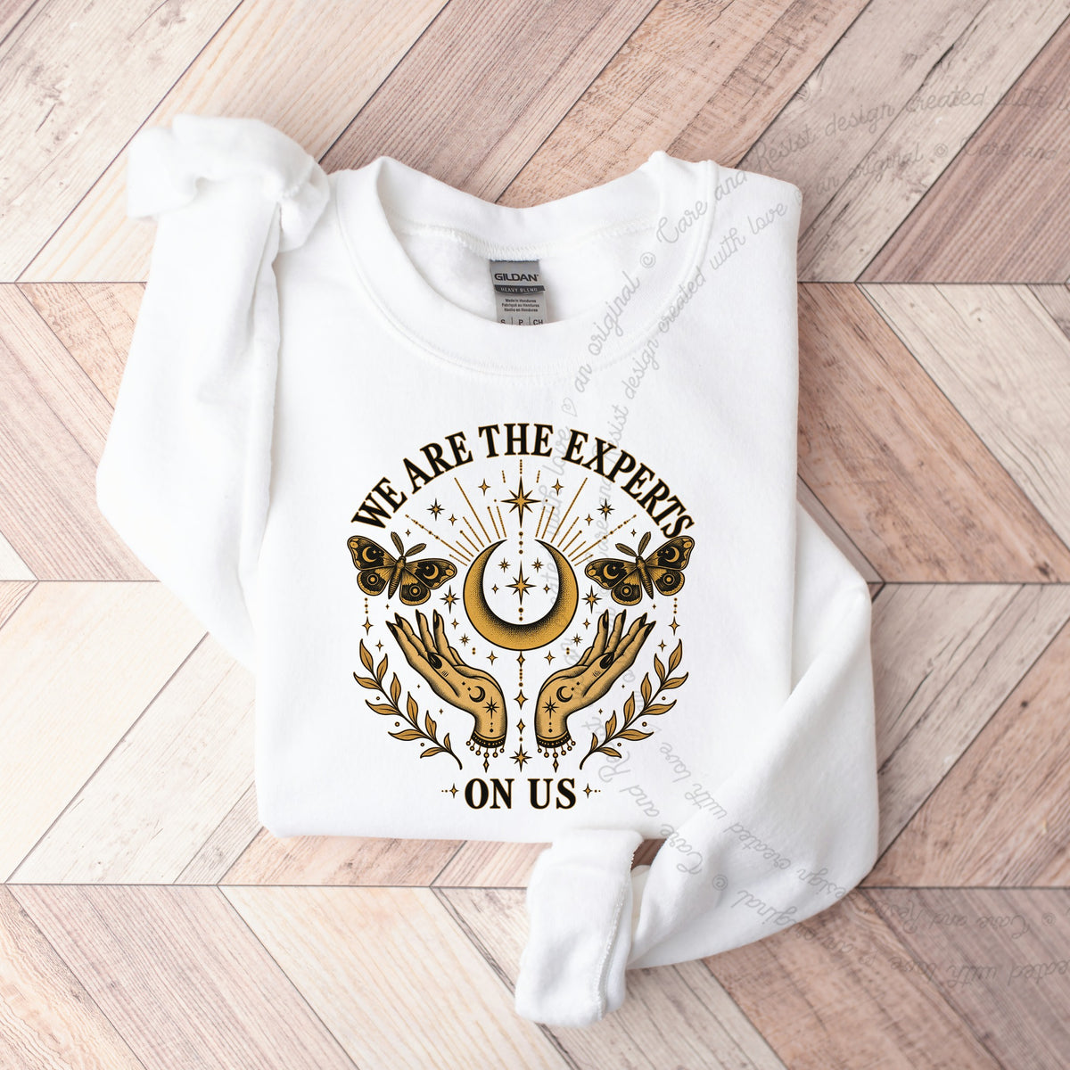 We are the Experts on Us Celestial Care & Resist Gildan crewneck sweatshirt in White