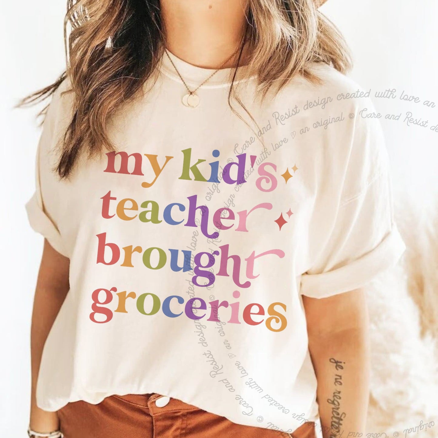 My Kid's Teacher Brought Groceries Care & Resist rainbow Comfort Colors tee, Ivory