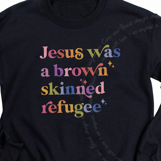 Jesus Was a Brown Skinned Refugee Care & Resist Gildan crewneck sweatshirt in Black