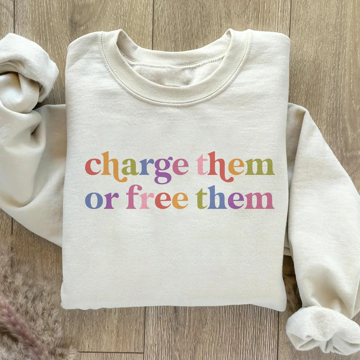 Charge Them or Free Them Care & Resist Gildan crewneck sweatshirt in Sand