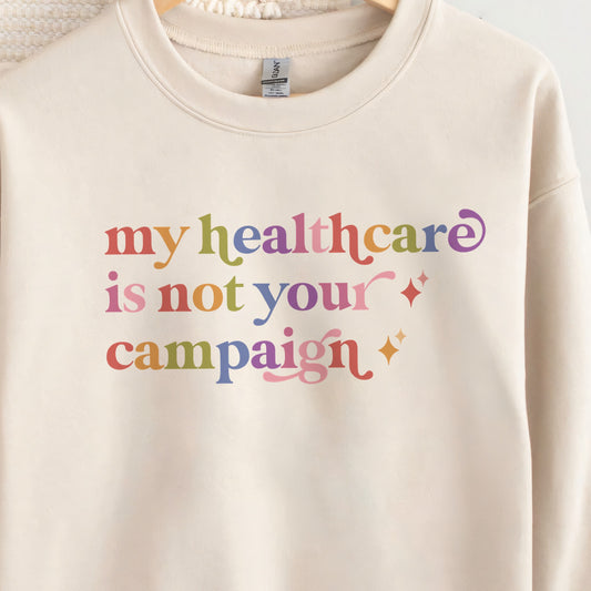 My Healthcare is not Your Campaign Care & Resist Gildan crewneck sweatshirt in Sand