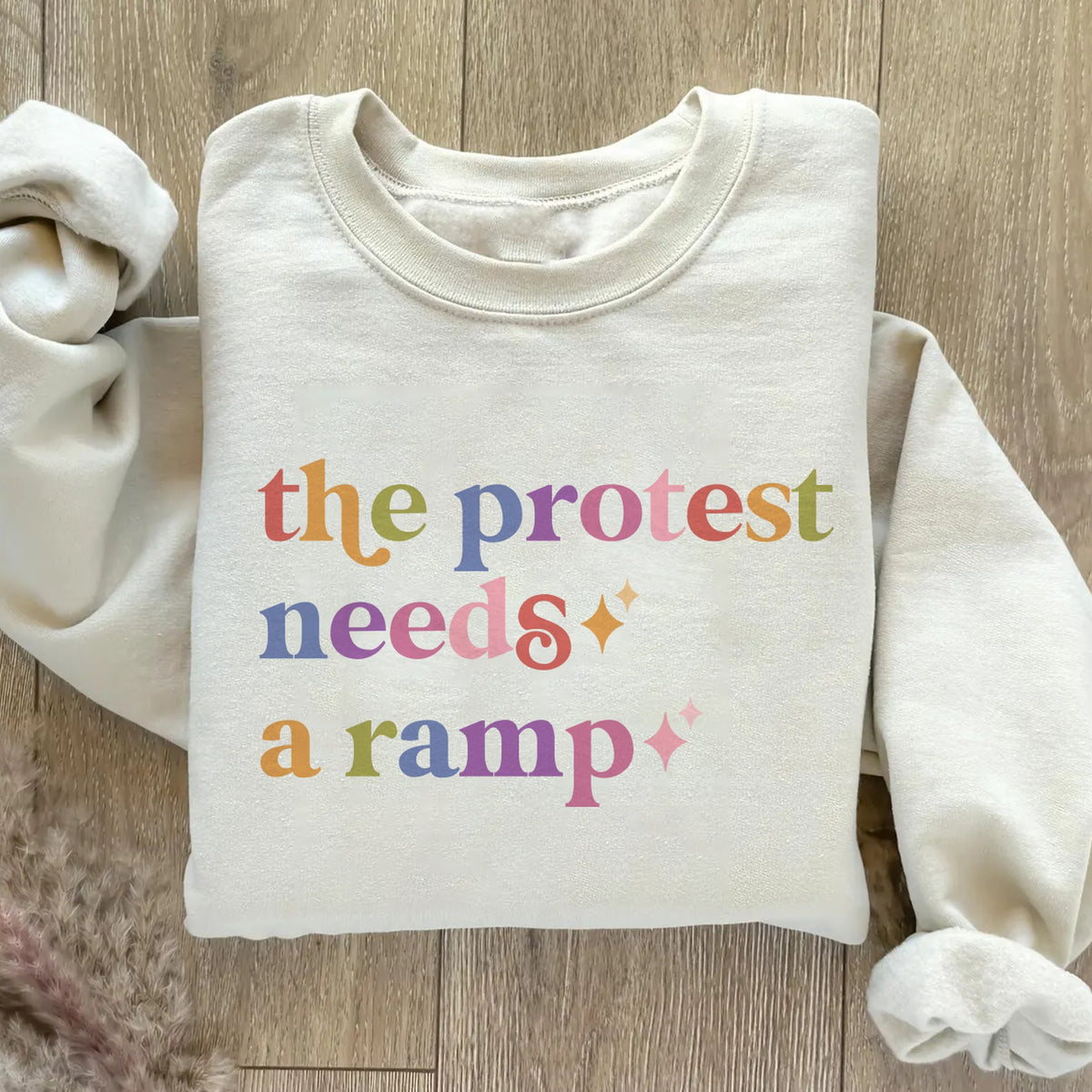 The Protest Needs a Ramp Care & Resist Gildan crewneck sweatshirt in Sand