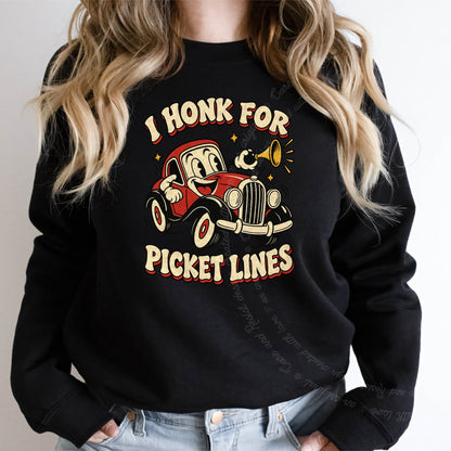 I Honk for Picket Lines Cartoon Care & Resist Gildan crewneck sweatshirt in Black