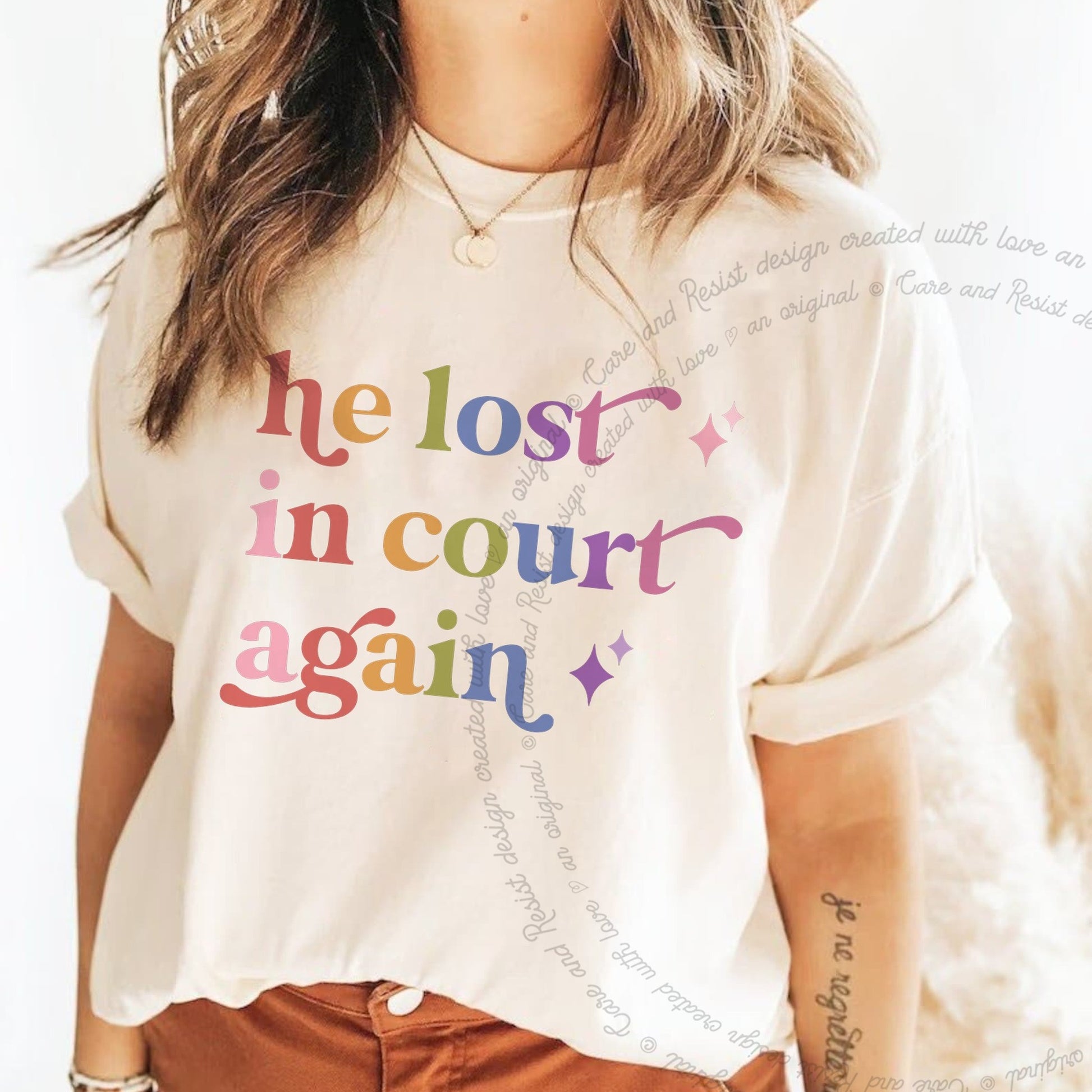 He Lost in Court Again Care & Resist rainbow Comfort Colors tee, Ivory