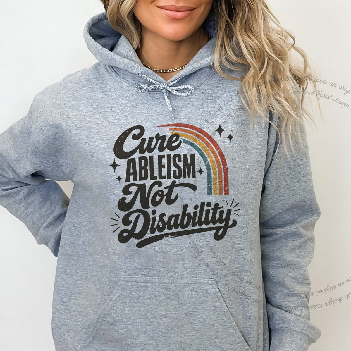 Cure Ableism not Disability Badge Care & Resist Gildan hoodie in Sport Grey