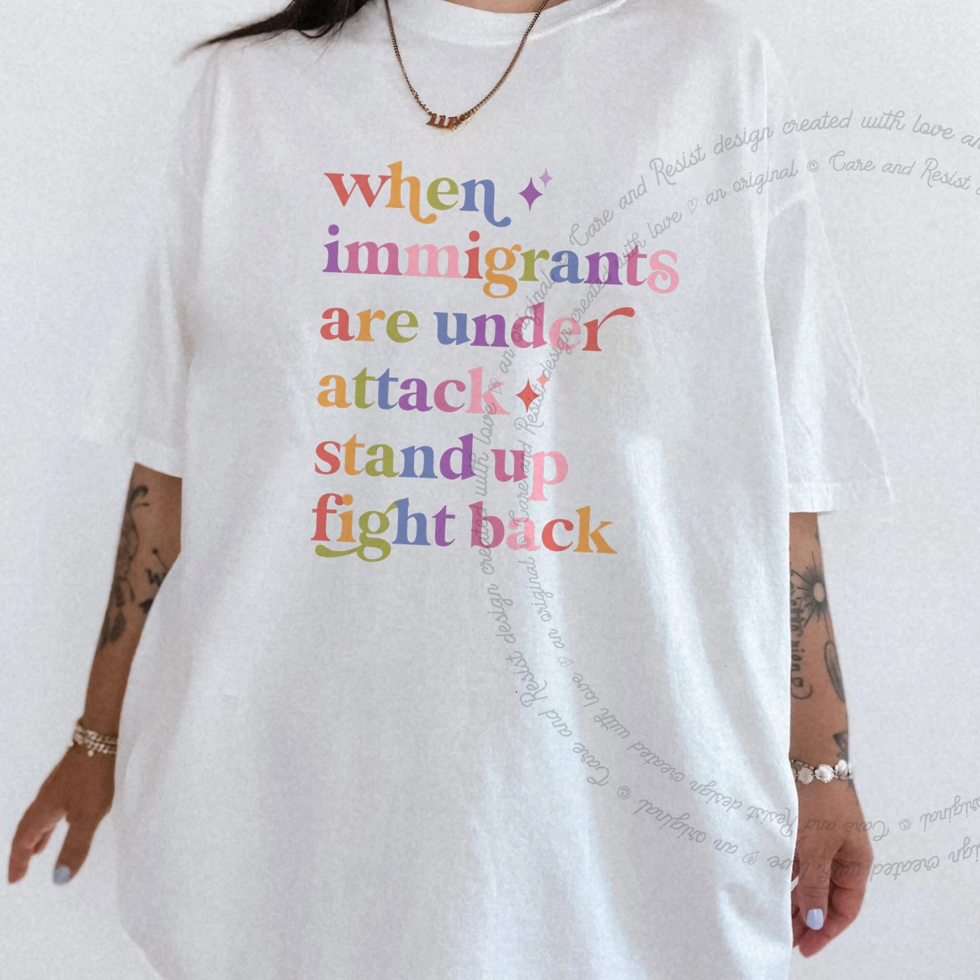 When Immigrants are Under Attack Care & Resist rainbow Comfort Colors tee, White