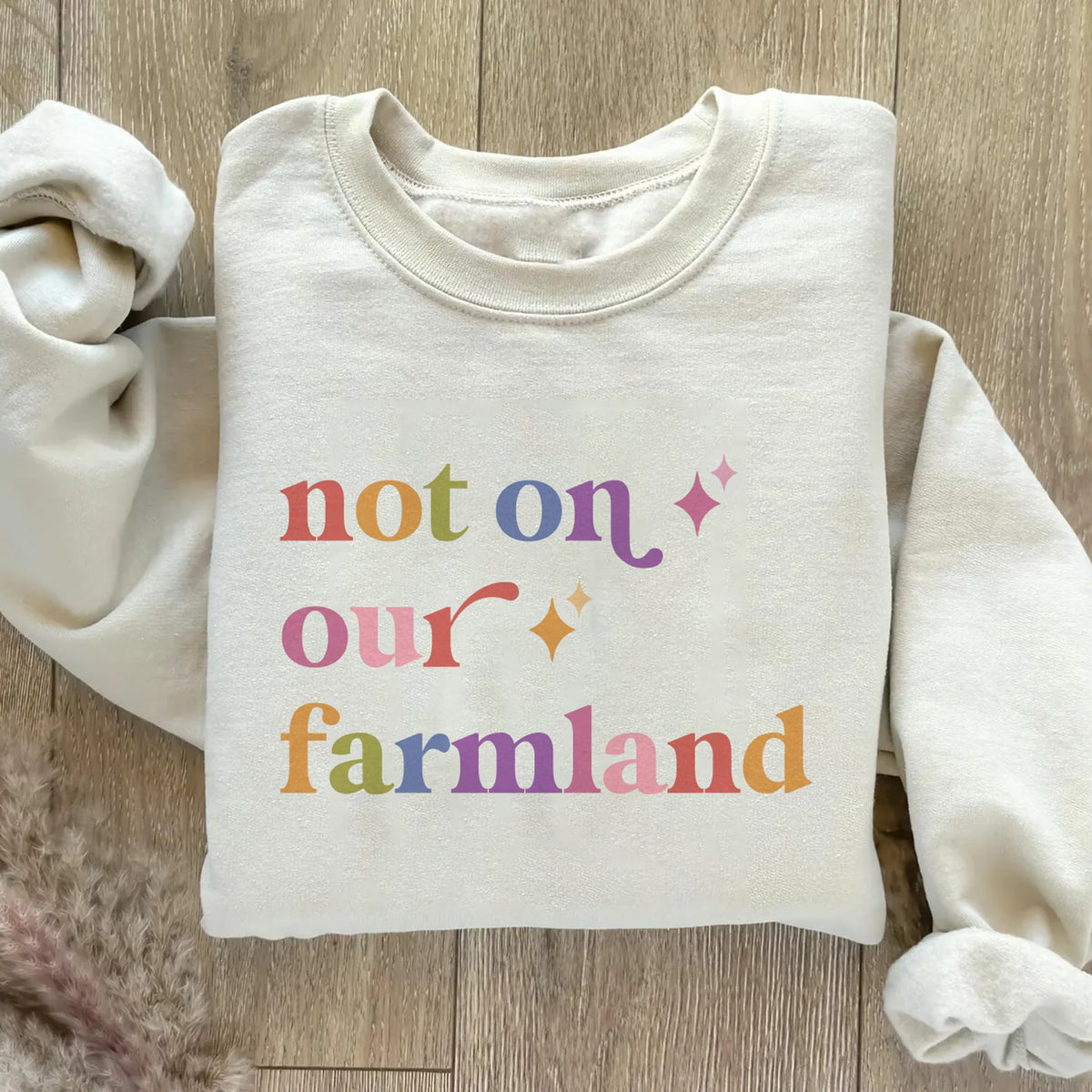 Not on Our Farmland Care & Resist Gildan crewneck sweatshirt in Sand