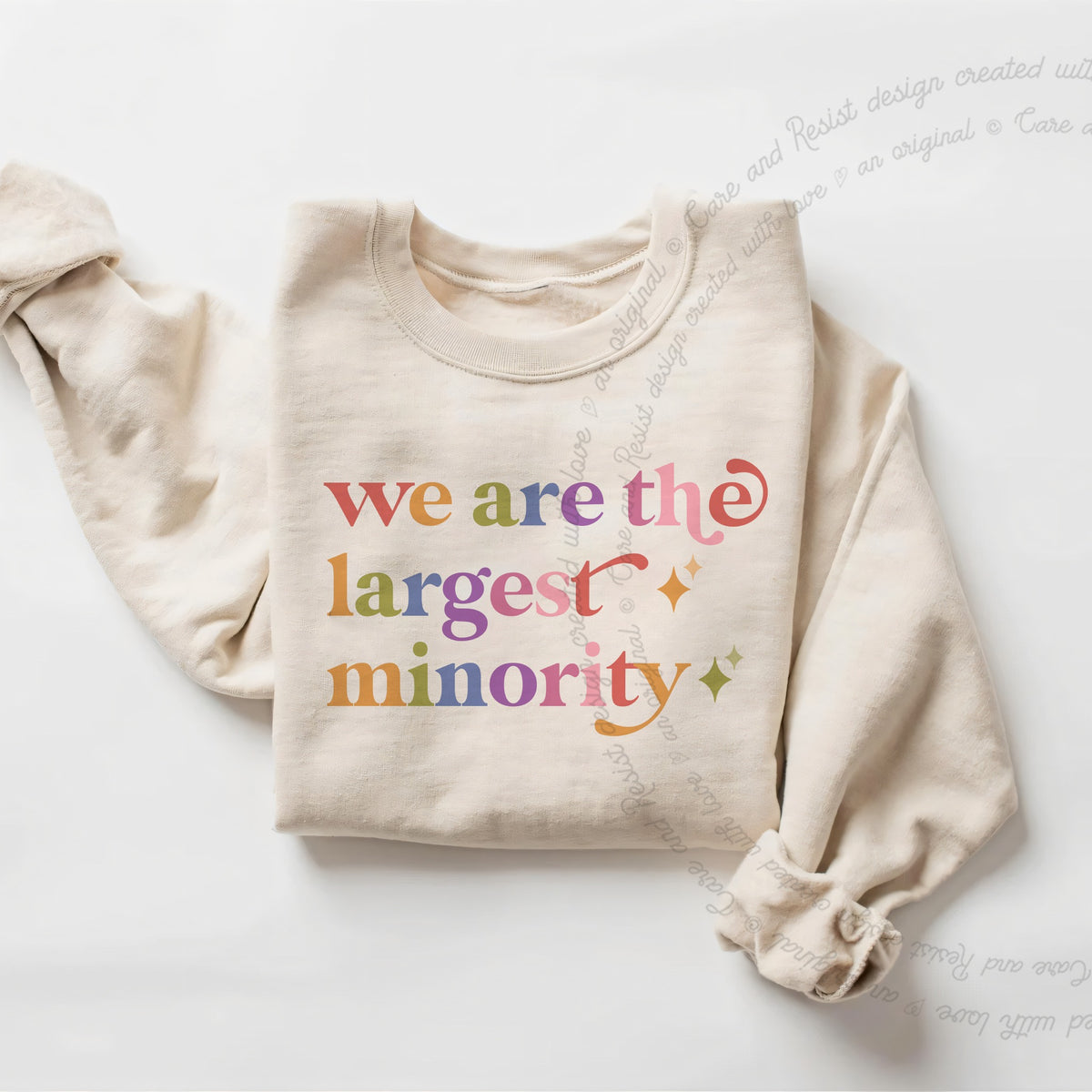 We are the Largest Minority Care & Resist Gildan crewneck sweatshirt in Sand