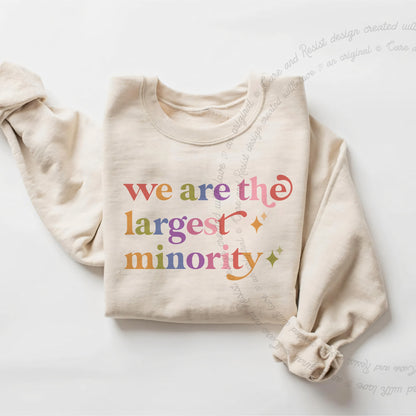 We are the Largest Minority Care & Resist Gildan crewneck sweatshirt in Sand