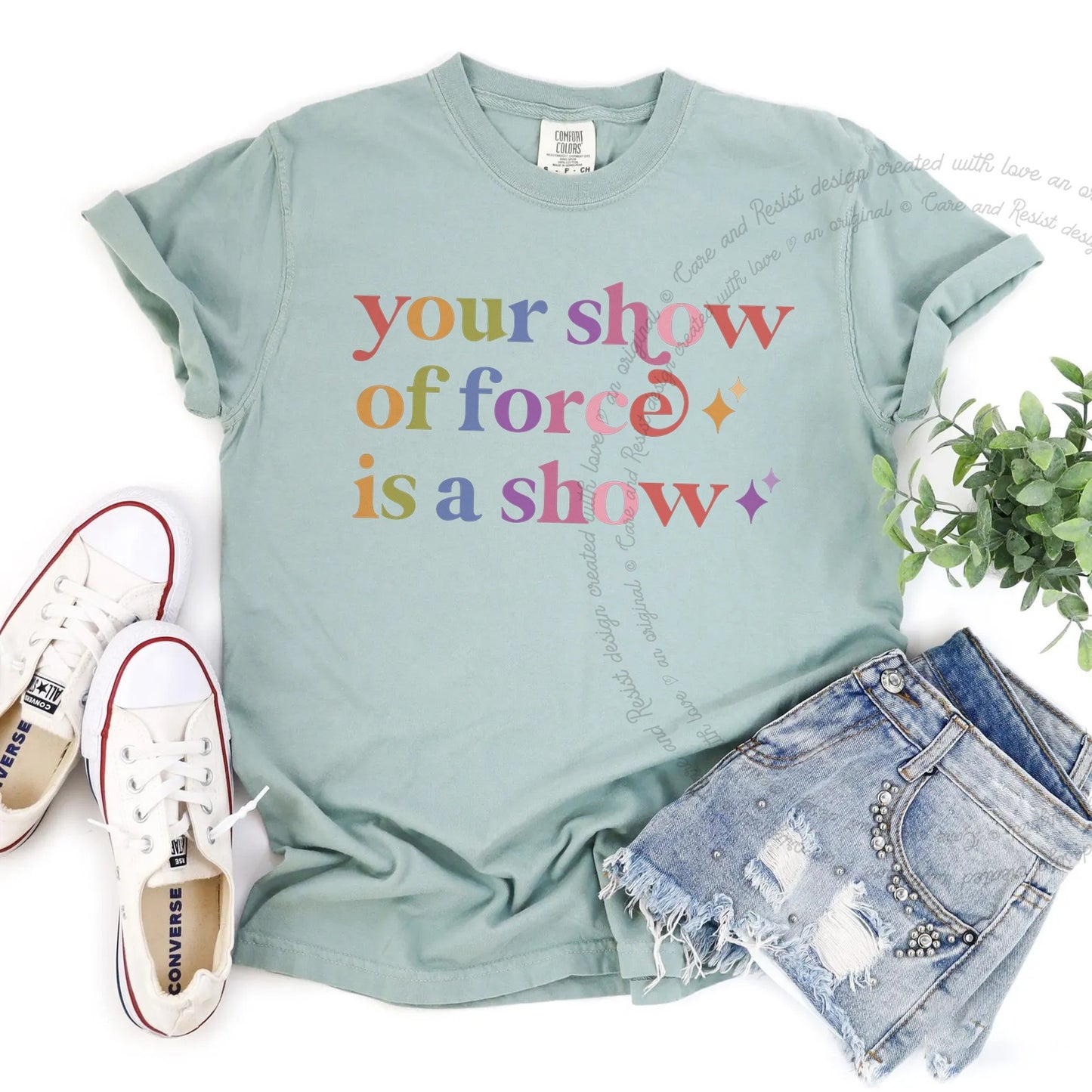 Your Show of Force is a Show Care & Resist rainbow tee
