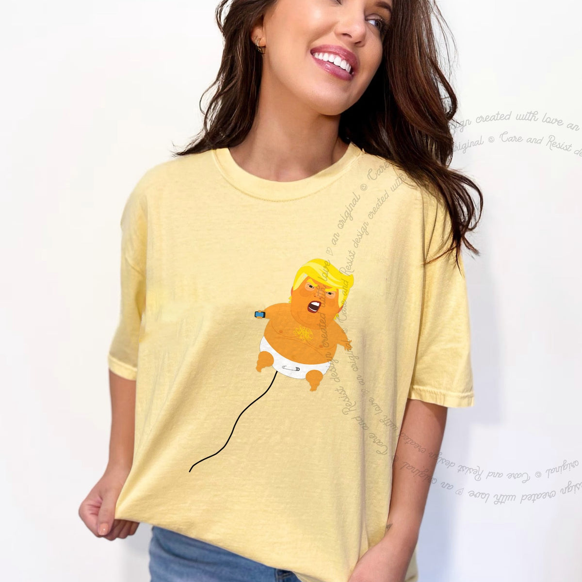 Trump Baby Blimp Care & Resist progressive t-shirt in Banana
