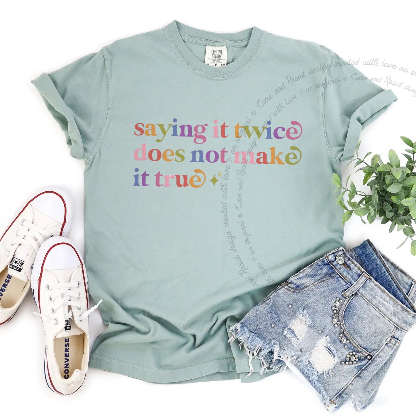 Saying It Twice Does not Make It True Care & Resist rainbow tee