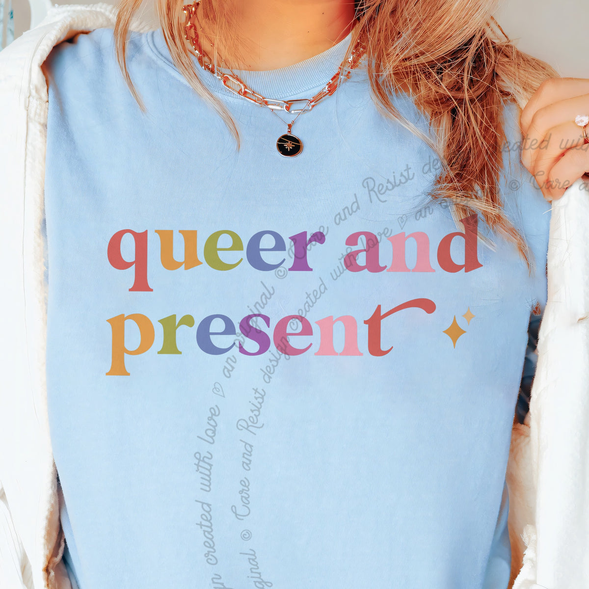 Queer and Present Care & Resist progressive t-shirt in Chambray