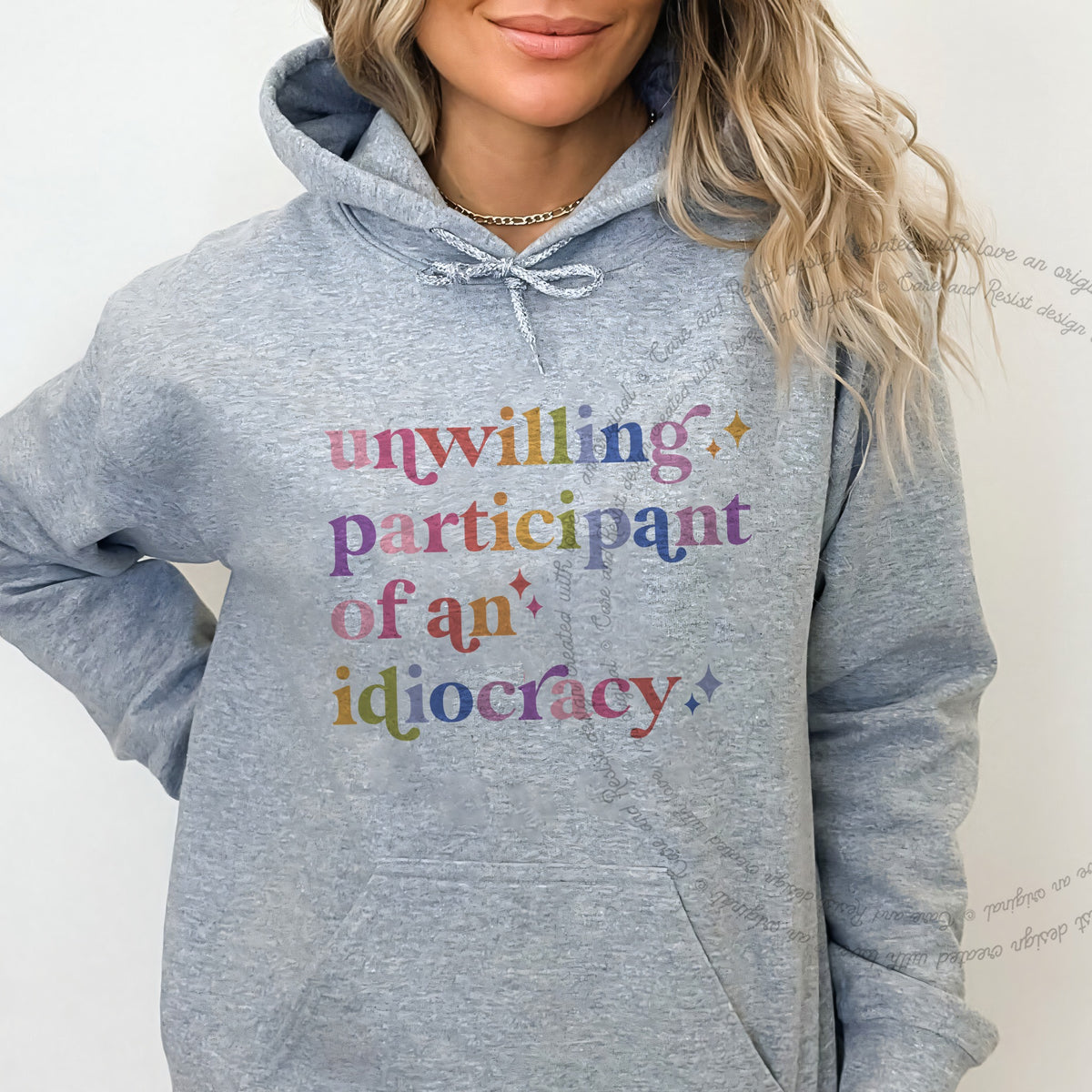 Unwilling Participant of an Idiocracy Care & Resist Gildan hoodie in Sport Grey