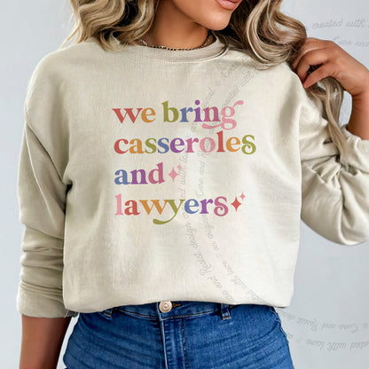 We Bring Casseroles and Lawyers Care & Resist Gildan crewneck sweatshirt in Sand
