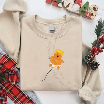 Trump Baby Blimp Care & Resist Gildan crewneck sweatshirt in Sand