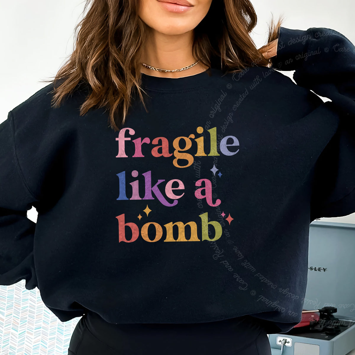 Fragile Like a Bomb Care & Resist Gildan crewneck sweatshirt in Black