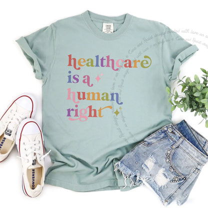 Healthcare is a Human Right Care & Resist rainbow Comfort Colors tee, Bay