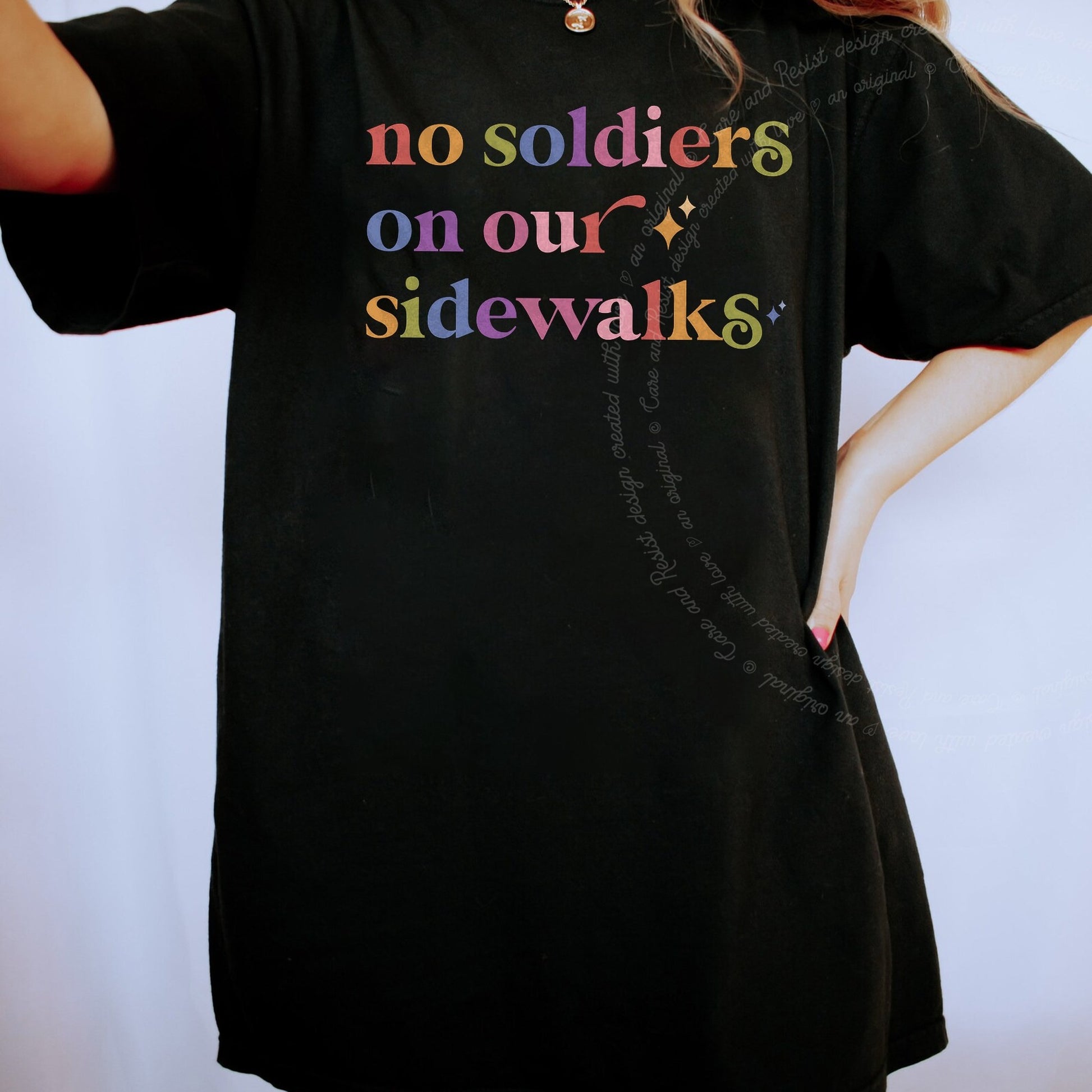 No Soldiers on Our Sidewalks Care & Resist rainbow tee