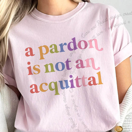 A Pardon is not an Acquittal Care & Resist progressive t-shirt in Blossom