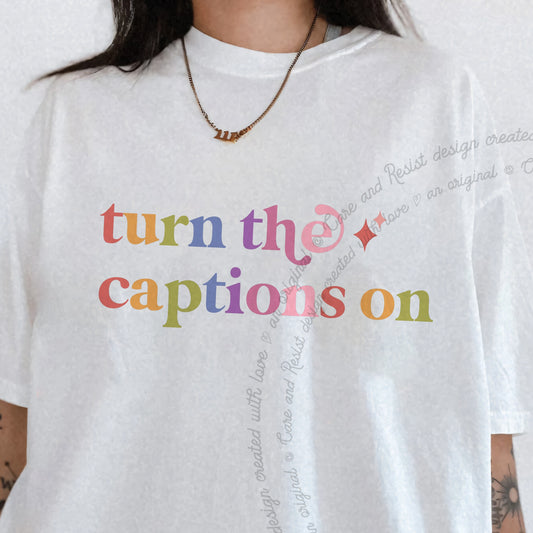 Turn the Captions on Care & Resist progressive t-shirt in White