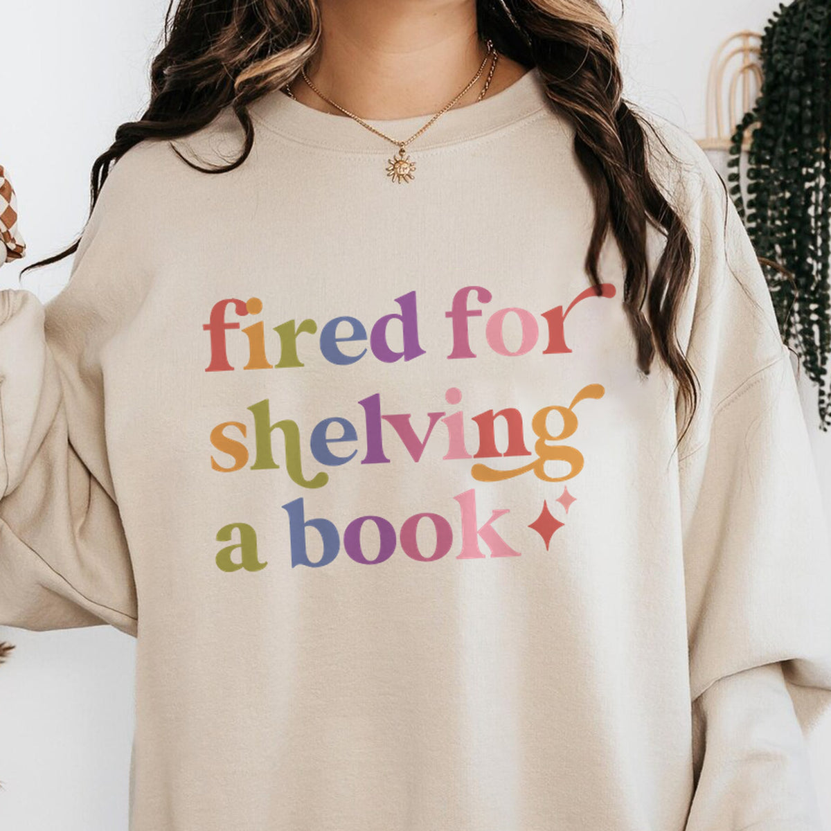Fired for Shelving a Book Care & Resist Gildan crewneck sweatshirt in Sand