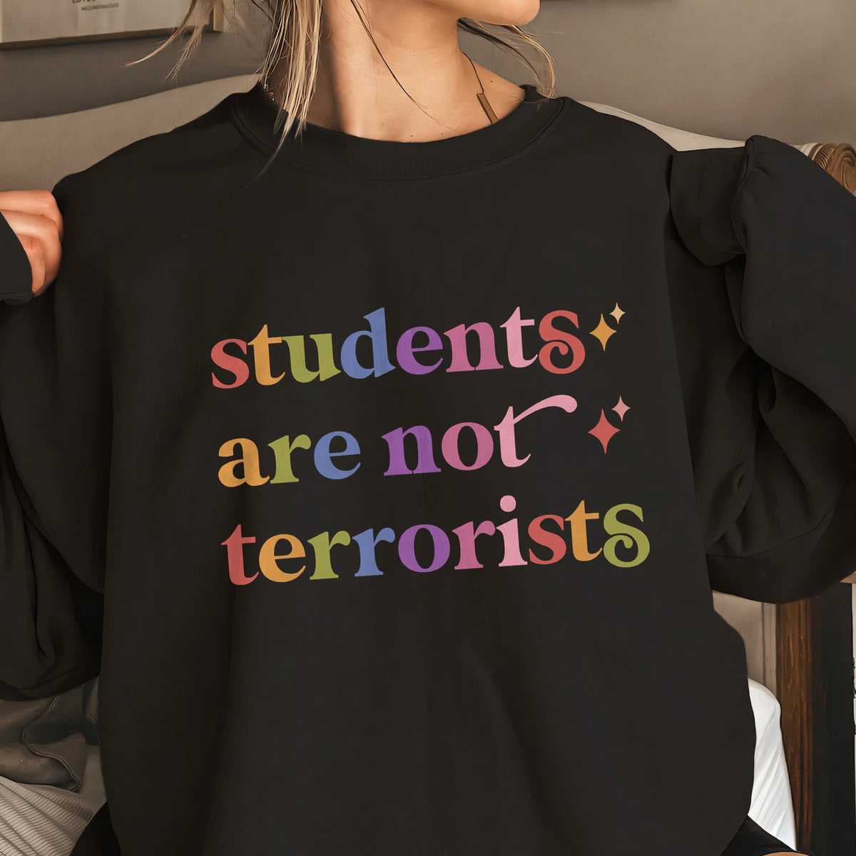 Students are not Terrorists Care & Resist Gildan crewneck sweatshirt in Black
