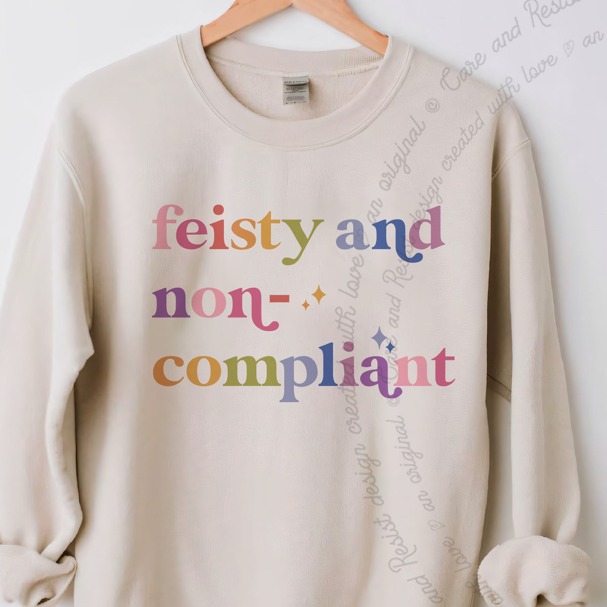 Feisty and Non-compliant Care & Resist Gildan crewneck sweatshirt in Sand