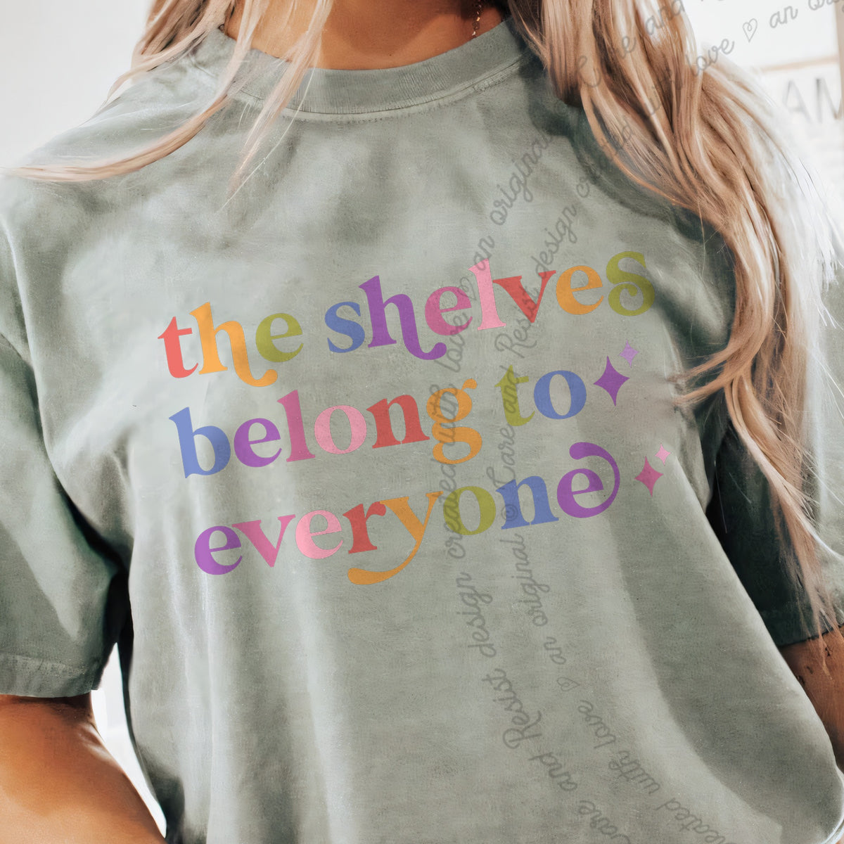 The Shelves Belong to Everyone Care & Resist progressive t-shirt in Bay