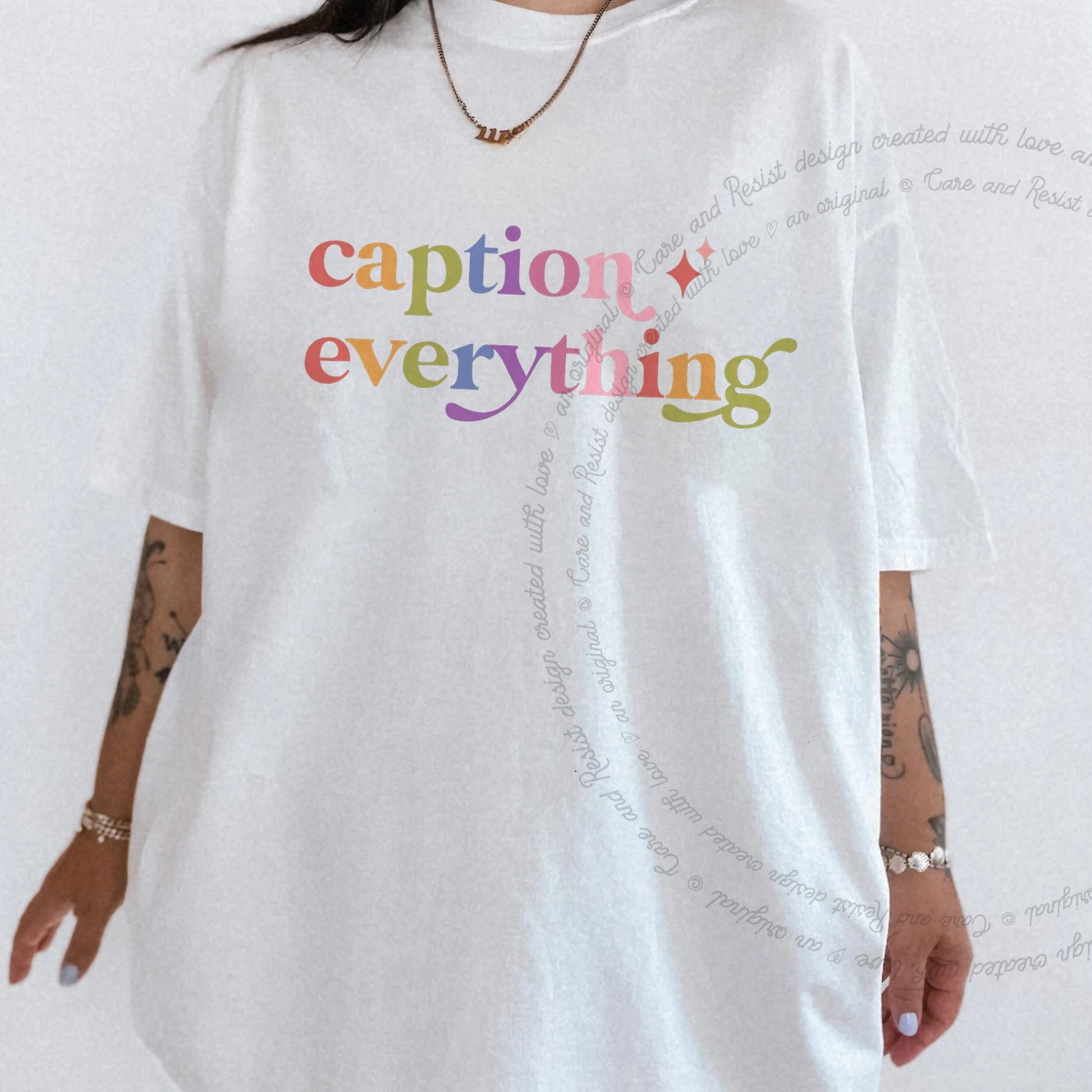 Caption Everything Care & Resist rainbow tee