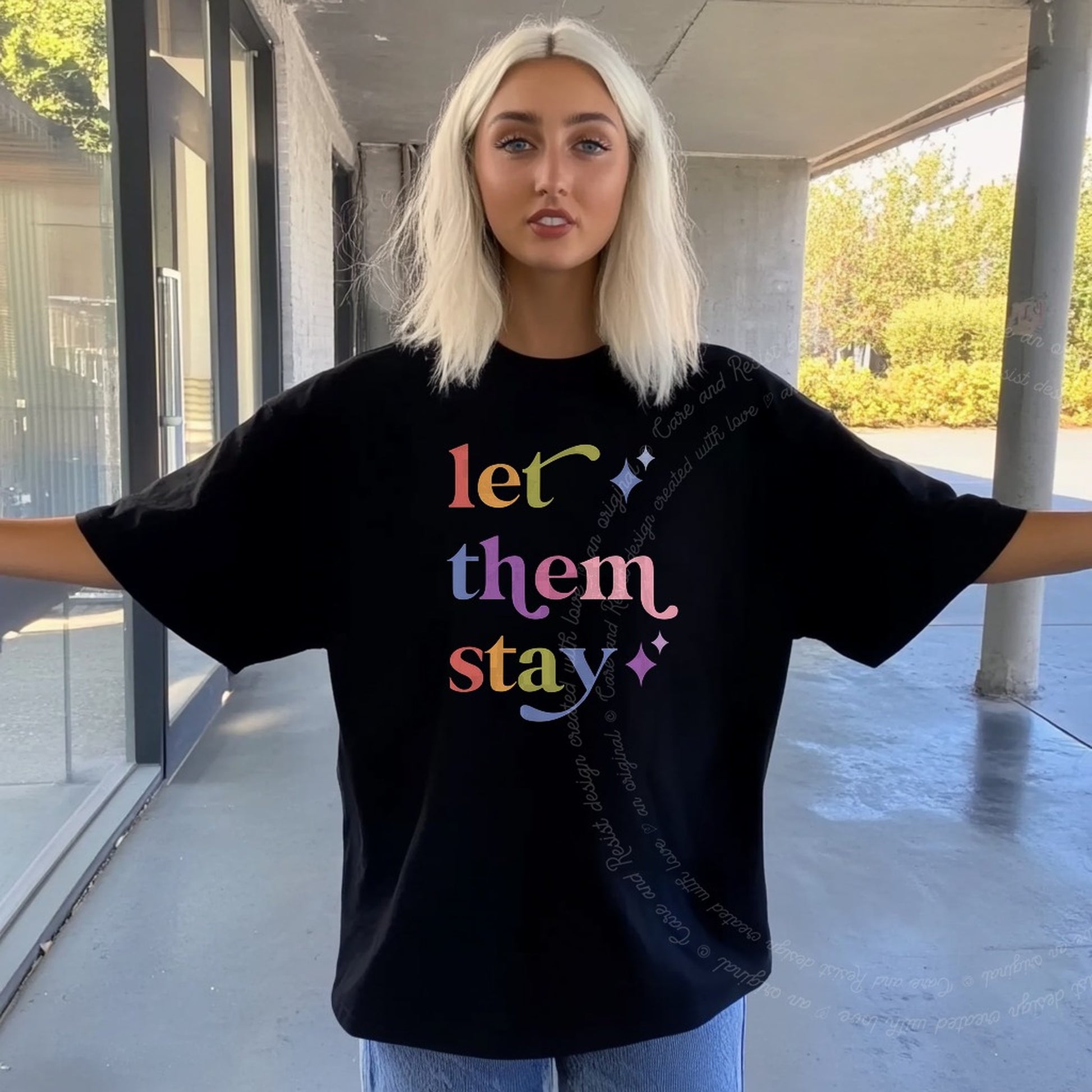 Let Them Stay Care & Resist rainbow Comfort Colors tee, Black