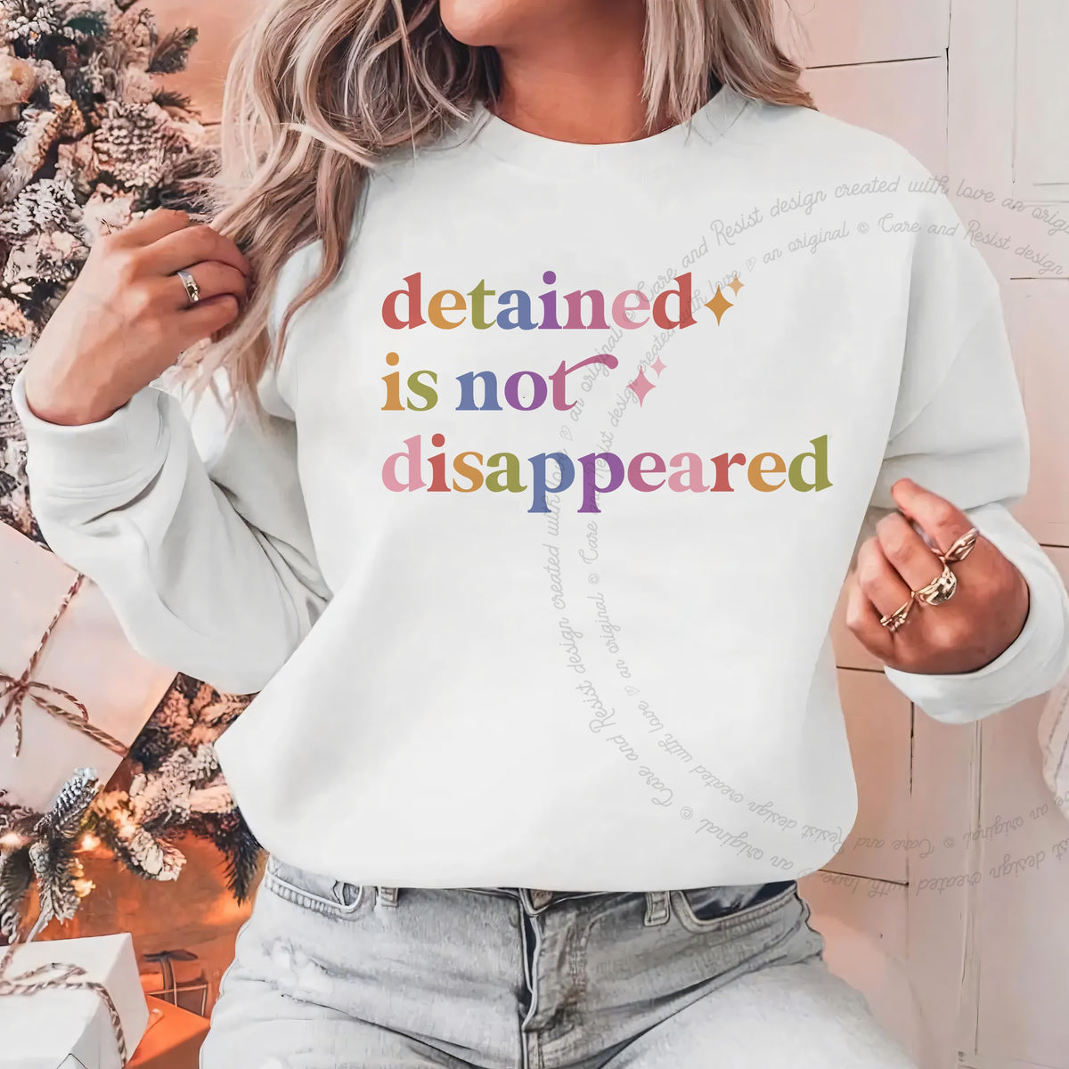 Detained is not Disappeared Care & Resist Gildan crewneck sweatshirt in White