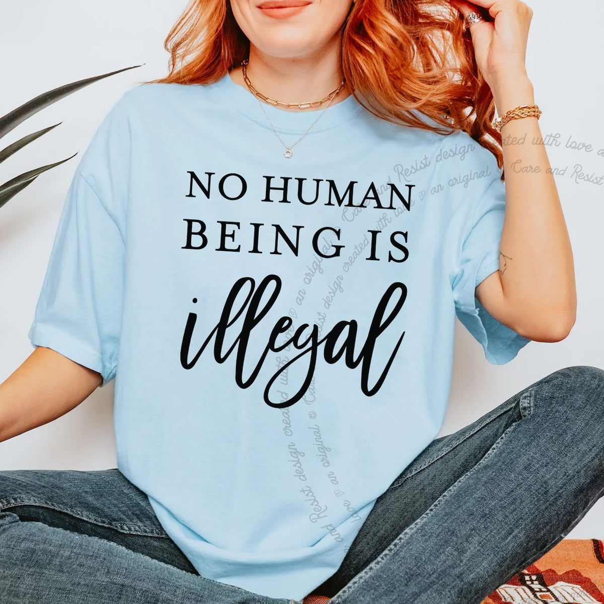 No Human Being Is Illegal Care & Resist progressive t-shirt in Chambray