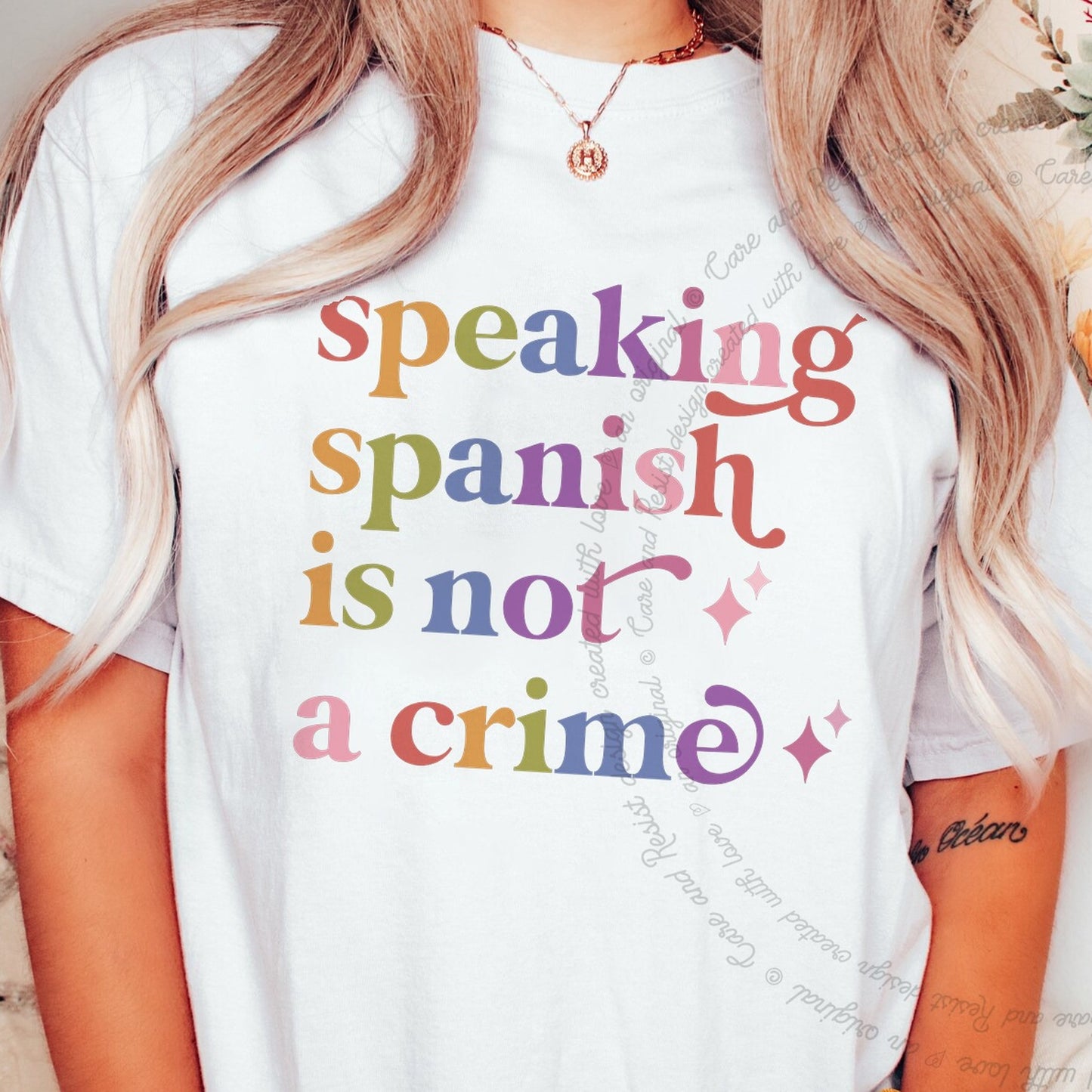 Speaking Spanish is not a Crime Care & Resist rainbow Comfort Colors tee, White