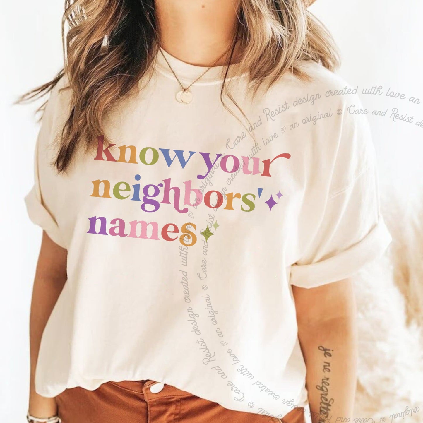 Know Your Neighbors' Names Care & Resist rainbow Comfort Colors tee, Ivory