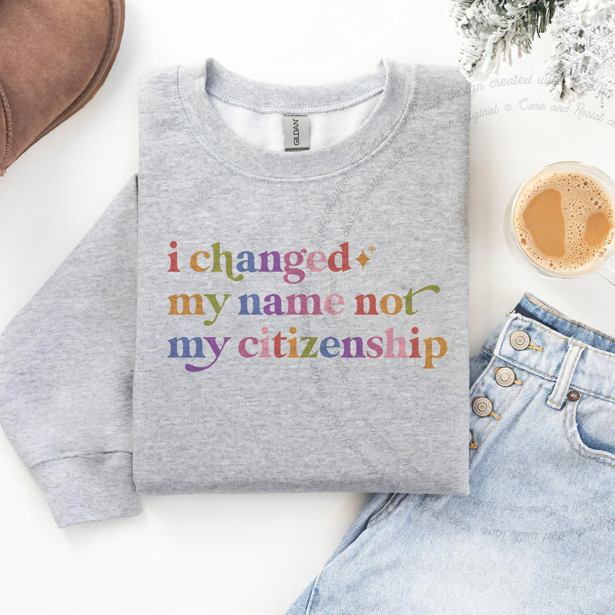 I Changed My Name not My Citizenship Care & Resist Gildan crewneck sweatshirt in Sport Grey