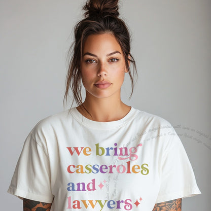We Bring Casseroles and Lawyers Care & Resist rainbow tee