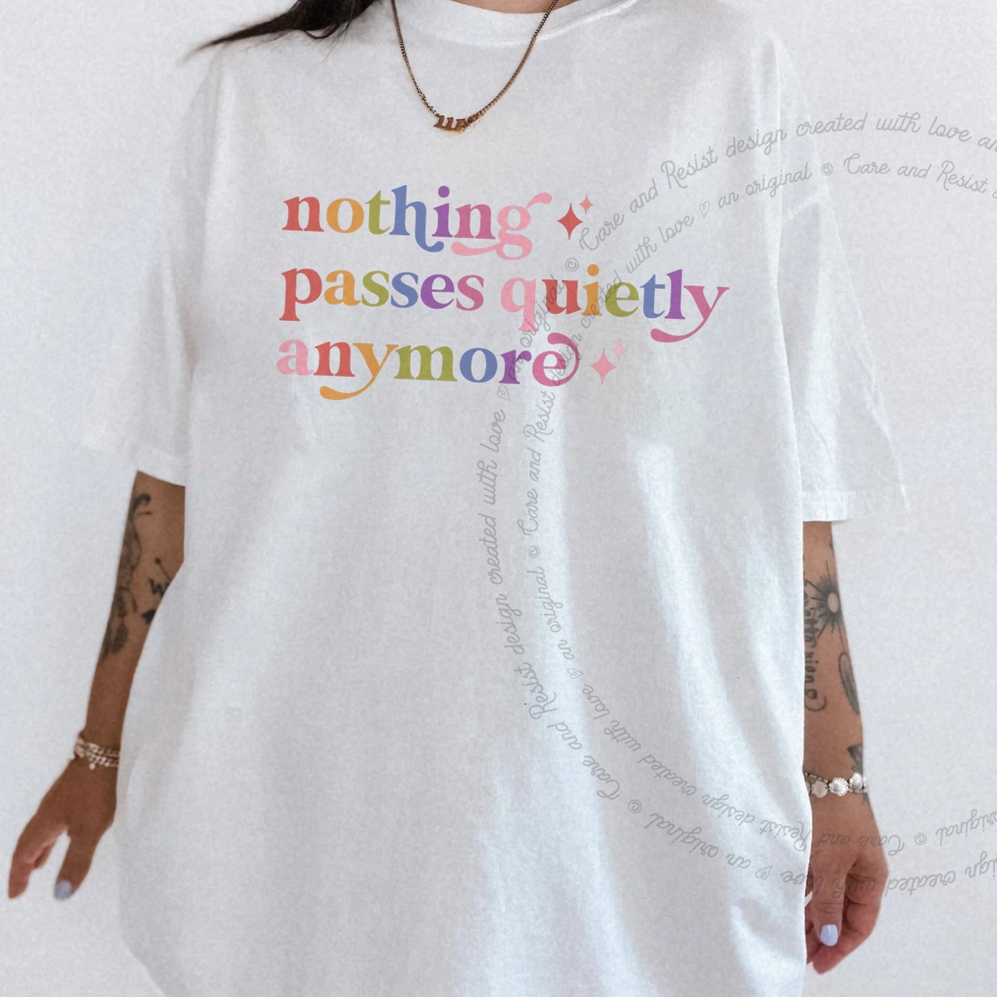 Nothing Passes Quietly Anymore Care & Resist rainbow tee