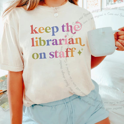 Keep the Librarian on Staff Care & Resist rainbow tee