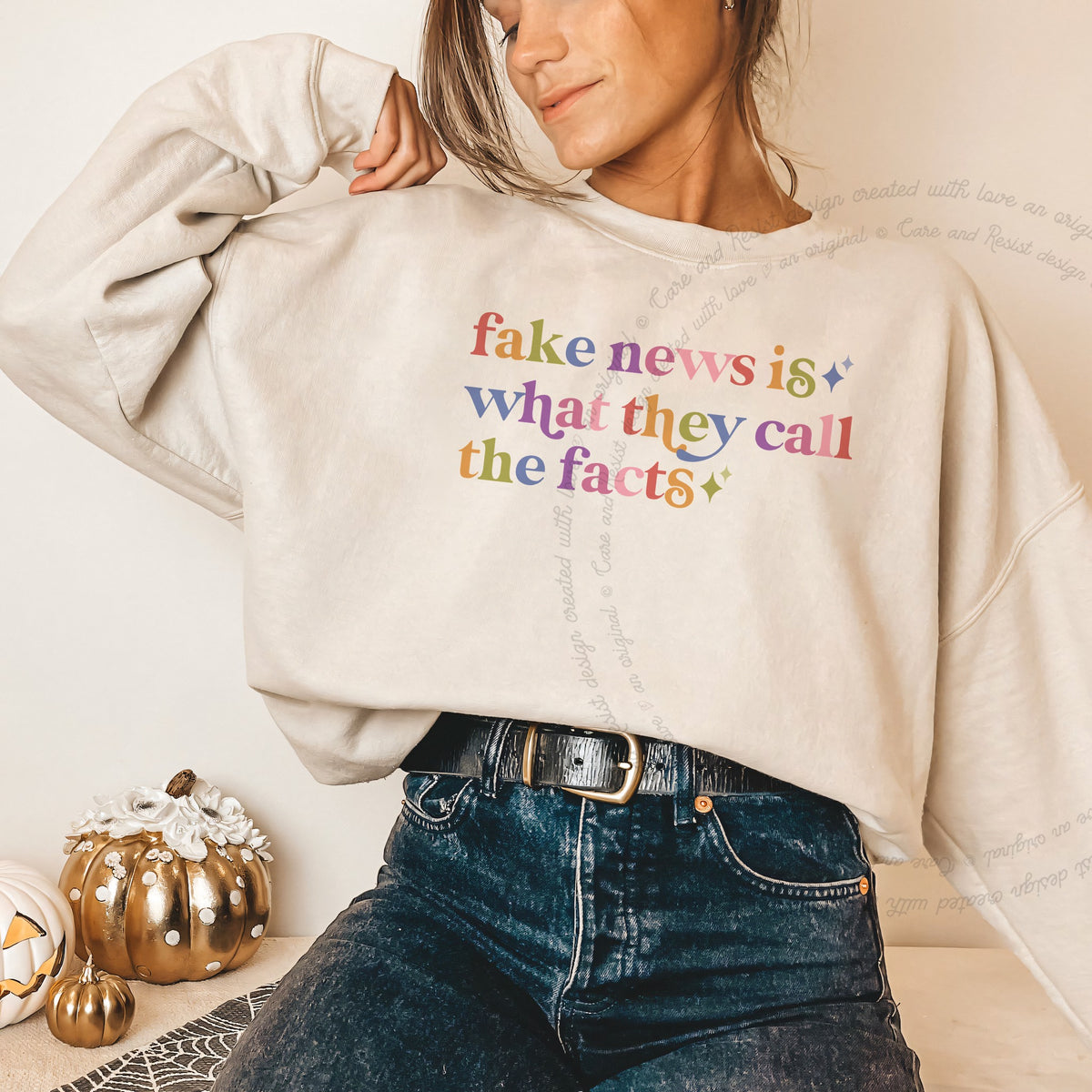 Fake News is What They Call the Facts Care & Resist Gildan crewneck sweatshirt in Sand