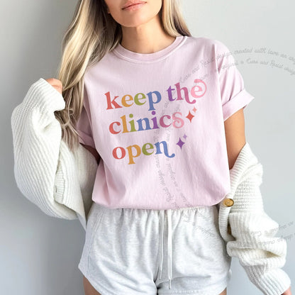 Keep the Clinics Open Care & Resist rainbow Comfort Colors tee, Blossom